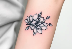 Branch with few magnolia flowers, in different blossom stages with botanical details tattoo idea