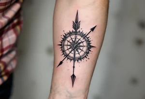 Rustic half compass half clock with and long native American arrow pointing at my wrist with the words “True North” tattoo idea