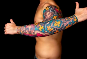 left arm full sleeve to support autism awareness full color and completed filled sons name written on there as well tattoo idea