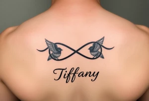 Infinity symbol with birds and the name Tiffany tattoo idea