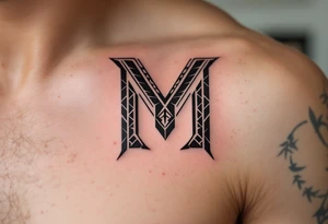 A tribal-inspired "M" in dark chestnut brown, featuring angular patterns. tattoo idea