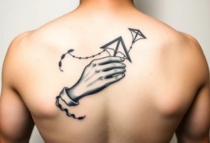 Hand holding  kite rip mum tattoo idea