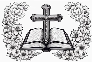 front of bible with cross on bible surrounded by flowers tattoo idea