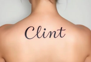 Clint spelled out in cartoon lettering tattoo idea