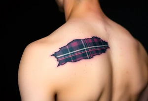 Dark Purple tartan fabric on bicep with skin ripping back to reveal tartan underneath tattoo idea