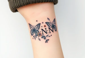 butterflies and flowers 
Letters L,M,N,O,P among the foliage tattoo idea