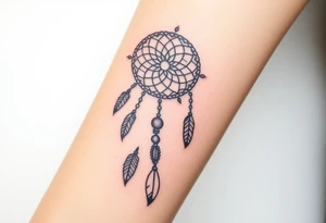native dreamcatcher with flowing feathers and sacred beads tattoo idea