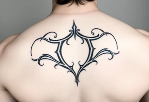 tribal open letter scroll tattoo idea
