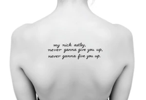 Young Rick Astley Meme Dance and Never Gonna Give You Up text tattoo idea