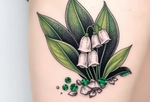 White lily in the valley bells with emeralds on the ground next to the plant tattoo idea