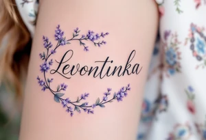 Leontýnka written in elegant script, surrounded by delicate lilac vines with small white blossoms. tattoo idea