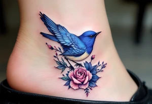 Blue bird with thick floral at the bottom tattoo idea