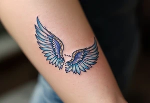 A pair of angel wings in light blue and lavender with “My Mother” between them. tattoo idea