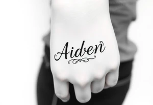 The name Aiden with love theme around it tattoo idea