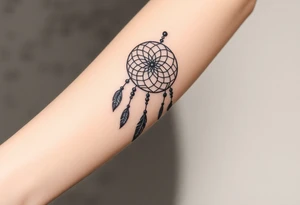 native dreamcatcher with flowing feathers and sacred beads tattoo idea
