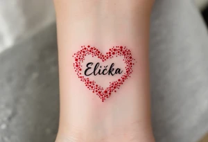 A delicate red heart with the name Eliška written in flowing script across the center. tattoo idea