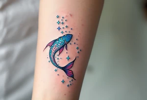 The Pisces constellation is dotted with tiny aquamarine stars that flow like water along the spine. tattoo idea