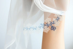 A delicate wedding veil flowing in the wind, adorned with lace patterns and soft, romantic shading tattoo idea