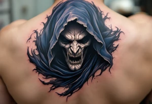 A grim face shaded in bone-white ink under a flowing midnight blue cloak. tattoo idea