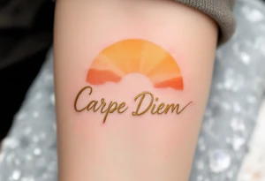 "Carpe Diem" in cursive gold ink with a sunrise gradient of soft oranges and yellows rising behind it. tattoo idea