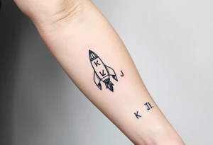 Rocket ship with letters K and J somewhere on it tattoo idea