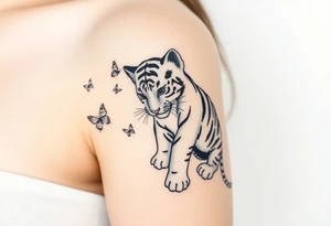 Tiger cub playing with butterflies tattoo idea