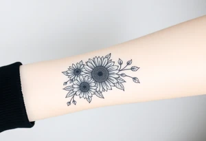 Large floral design with multiple types of flowers including sunflowers tattoo idea