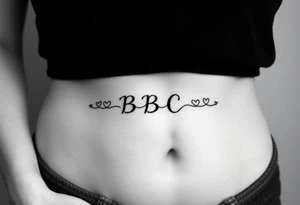 text reading "BBC" across a womb tattoo surrounded by hearts tattoo idea
