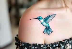 A delicate hummingbird in teal hovering near a child’s name in cursive reflects a mother’s ceaseless care and presence. tattoo idea