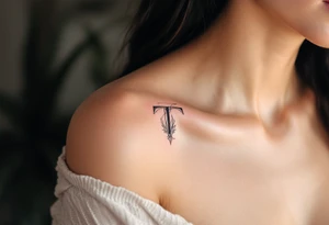 A sleek modern "T" in blush pink tattoo idea