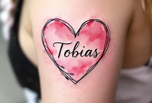 A soft pink heart outlined in black, cradling the name Tobias in cursive. tattoo idea