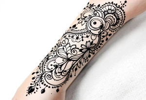 Indian style Henna tattoo for the inner wrist include the word pain in small font tattoo idea