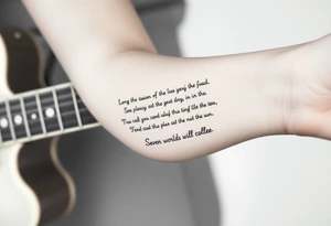 Gibson Les Paul guitar with the lyrics sheet music for the song Distant sun printed on the fret board of the guitar with the vocal music and the words to the line "Seven worlds will collide" tattoo idea