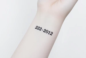 A sleek, minimalist barcode with the couple’s wedding date (22 - 12 - 2012) hidden in the numbers tattoo idea