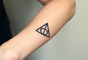 A gothic-style Deathly Hallows symbol tattoo idea