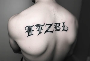 The name ITZEL sideways with a. Design on arm tattoo idea