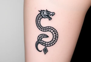 Ouroborous or dragon/serpent/snake eating its own tail in a figure 8 in negative space with geometric patterns on a leg tattoo design tattoo idea