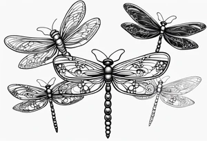4 simple dragonflies flying together tattoo idea