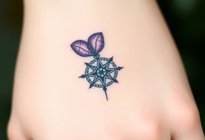 A single Violet with detailed compass at its center representing feminine power and an ankh or Celtic knot tattoo idea