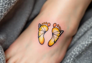 Bright yellow and pastel orange footprints of Tereza, gently paired with butterfly wings to capture her playful and free nature. tattoo idea