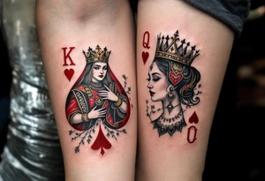 Two playing card symbols—King of Spades and Queen of Hearts—done in black, red, and subtle shading. tattoo idea