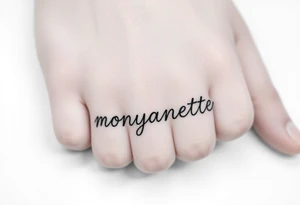 the name “monyanette” under the pinky side of the hand tattoo idea