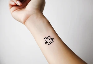 small, delicate tattoo in memory of my sister. We used to do puzzle together so I want one puzzle piece.  I want to include her handwritten message I have that says "to my favorite sister" tattoo idea