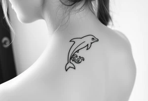 Dolphin and waves on spine tattoo idea