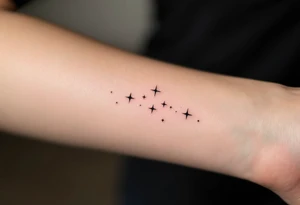 A subtle Sagittarius tattoo using only tiny white dots for stars, placed behind the ear. tattoo idea