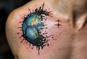 A stylized half-soccer ball, half-earth globe in blue, green, and black tones. tattoo idea