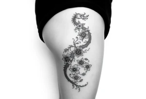 Leg area back of calf dragon going up 4 flowers
 Dragon flipped closer to the third one down realistic femine tattoo idea