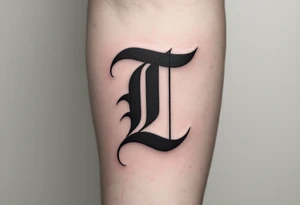 A bold black Gothic "T" with sharp serifs and subtle red shadowing. tattoo idea