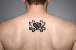 Two puzzle pieces that would only fit together with only the two to make one for two lovers tattoo idea