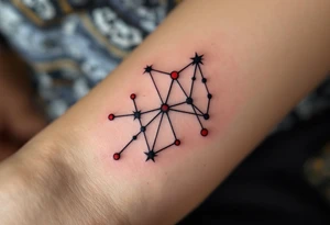 A geometric Capricorn constellation in crisp black ink with vibrant red dots marking each star. tattoo idea